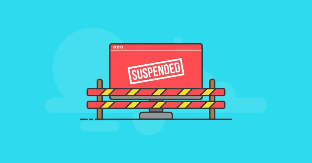Mensaje de cuenta suspendida con letrero rojo y barreras amarillas.